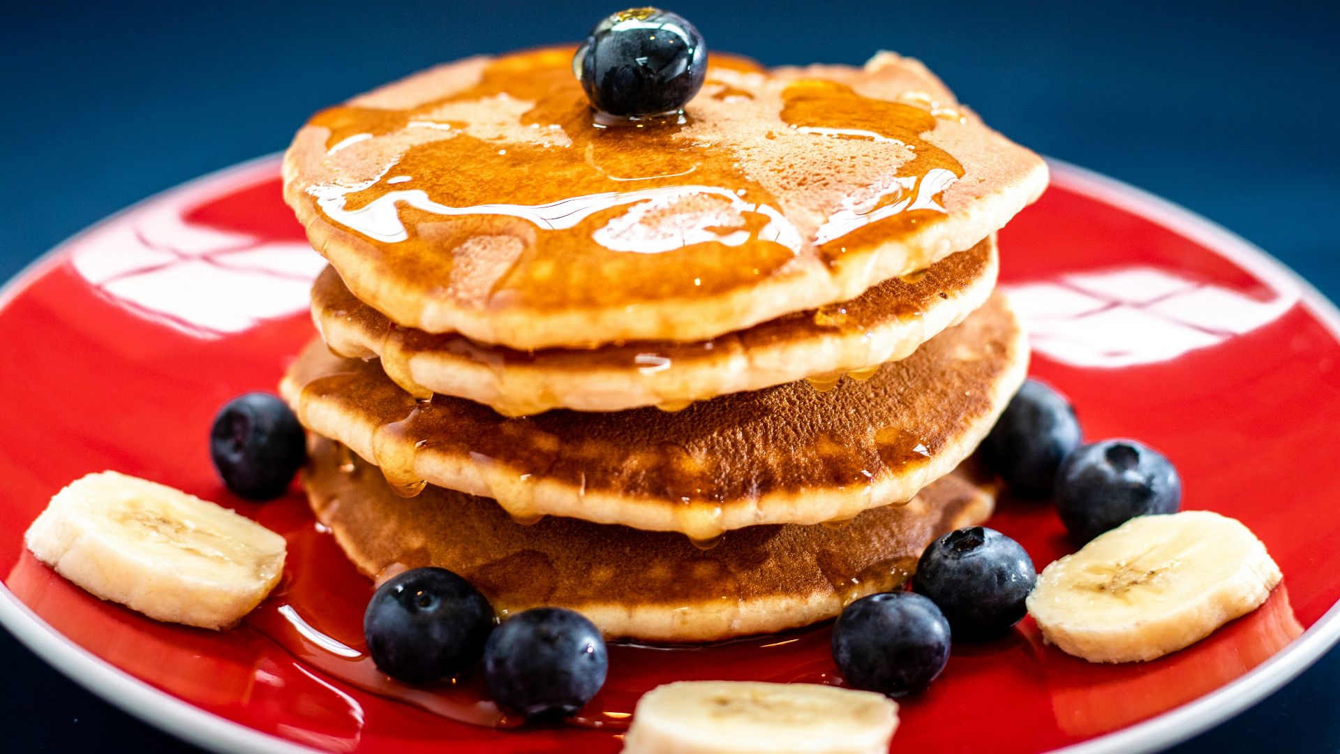 baked pancake with blueberry and slice of banan
