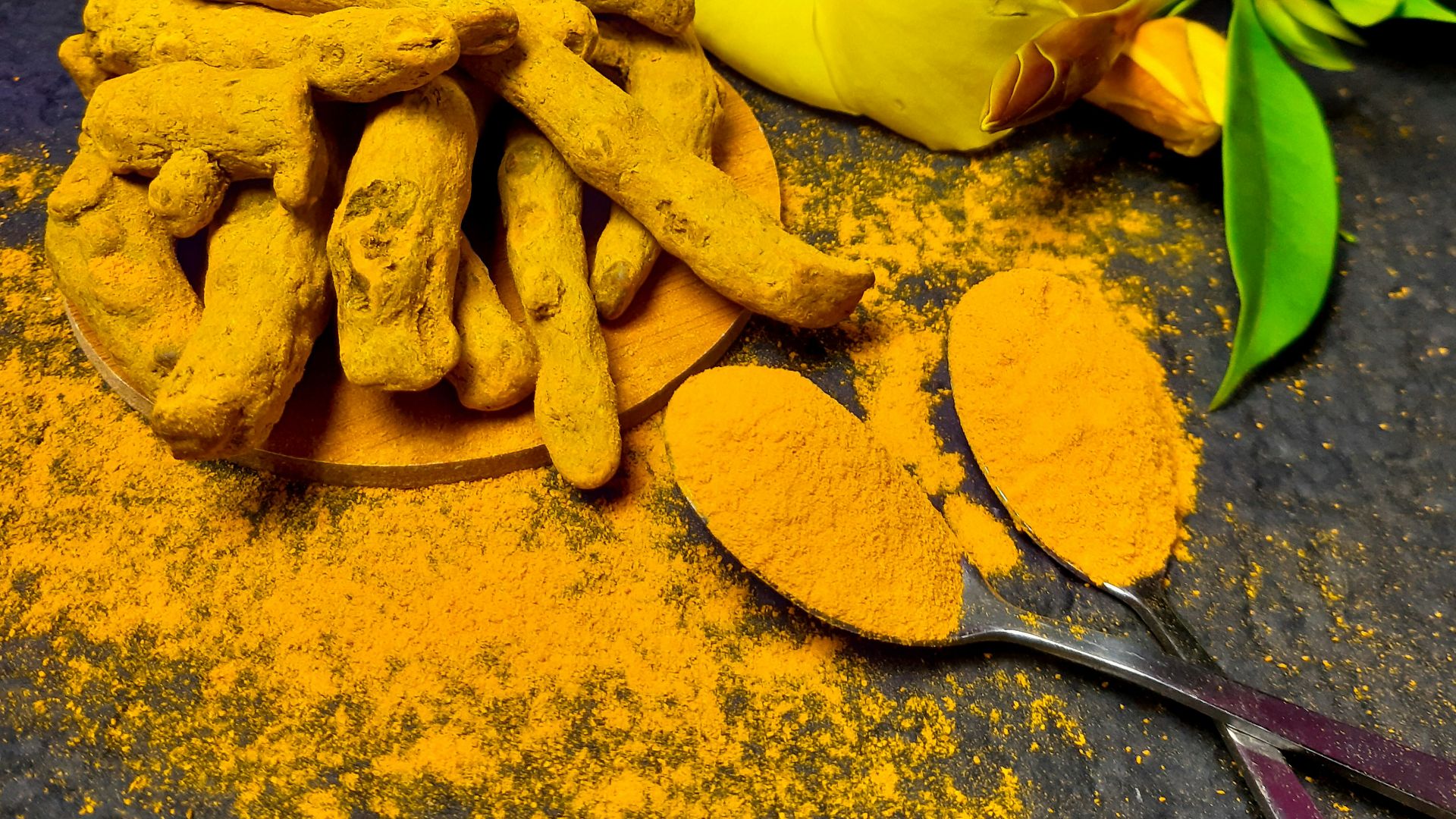 yellow flower on gray surface