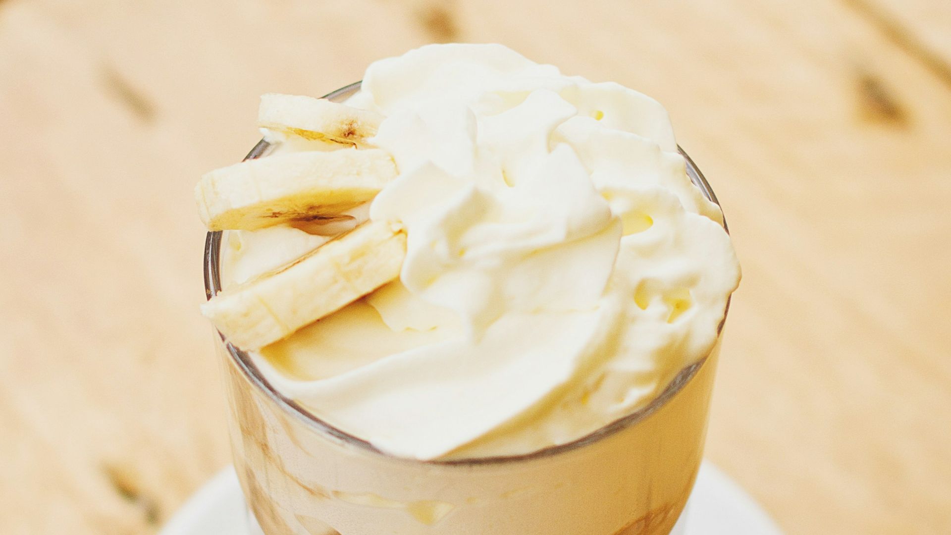 clear drinking glass filled with beverage