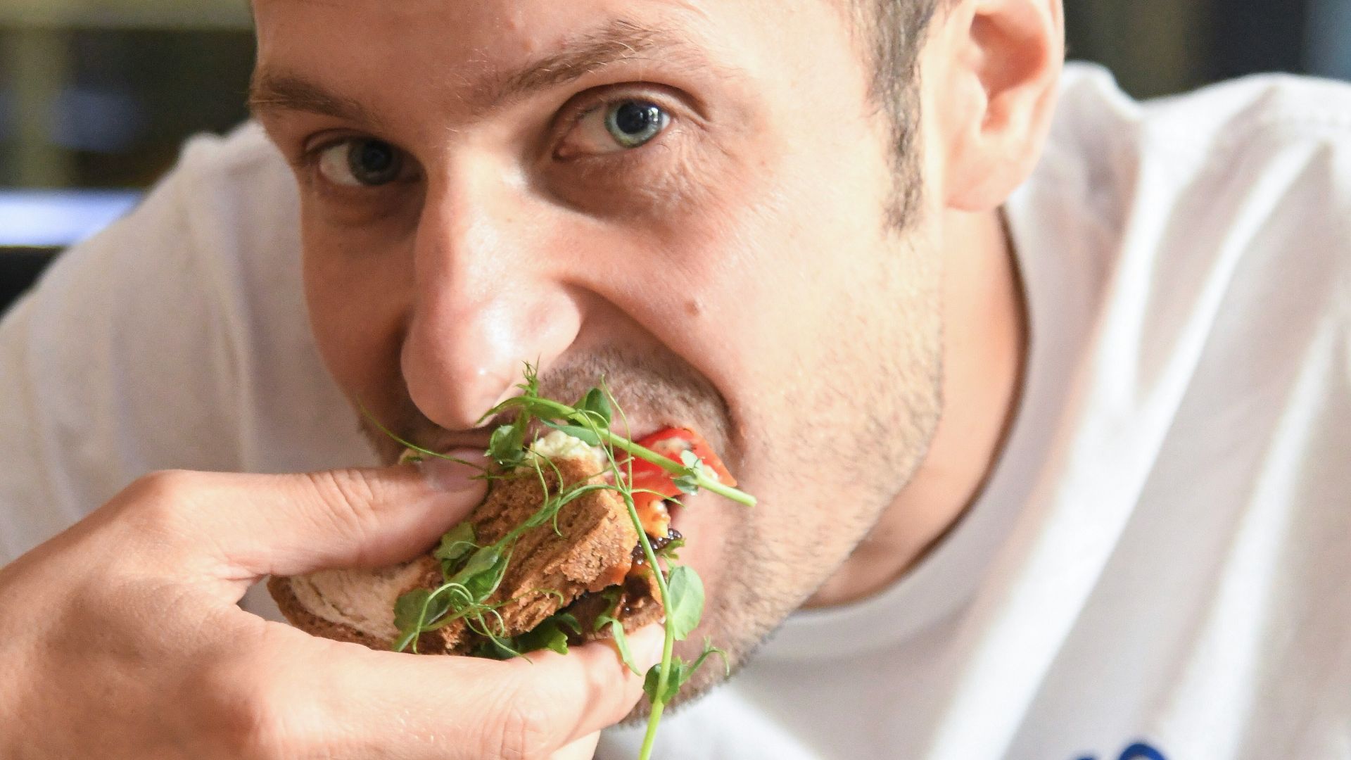 man eating a sandwich