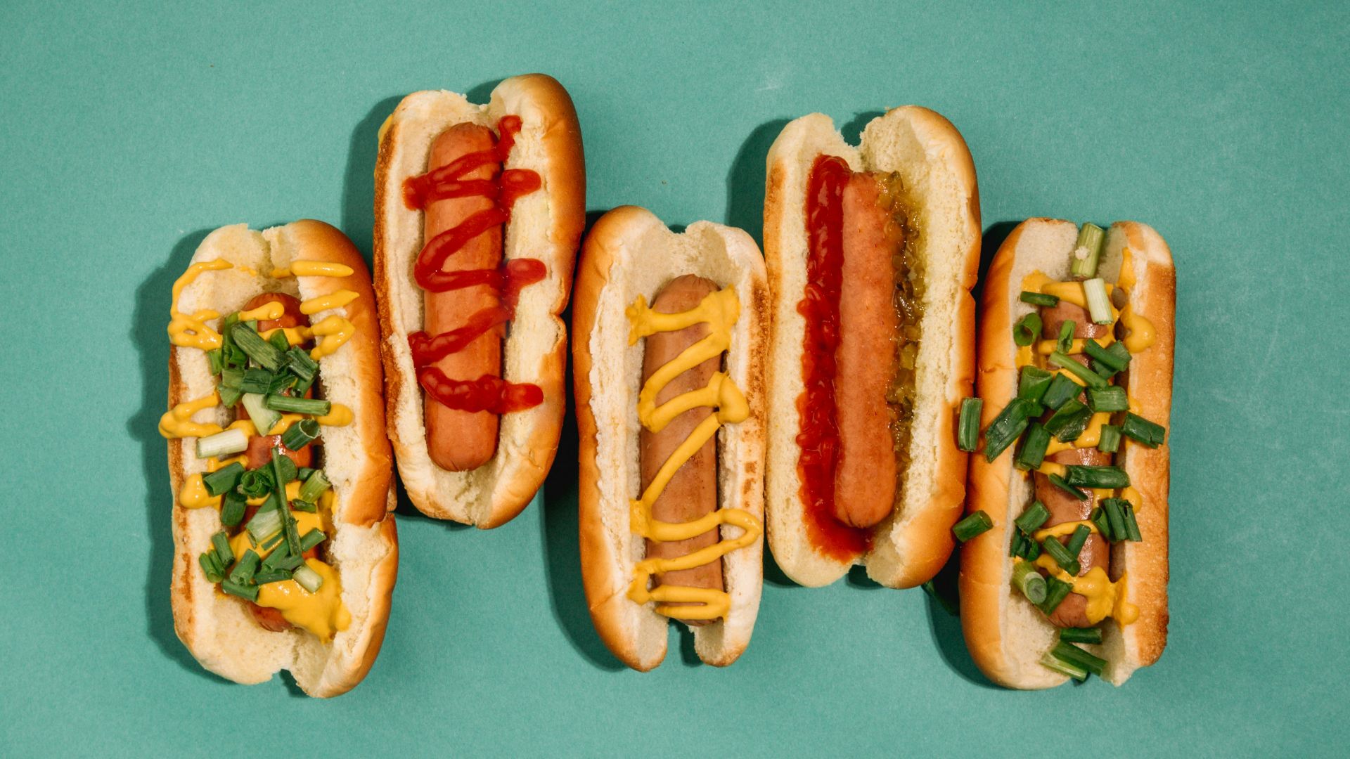 hotdog sandwich with tomato and cheese