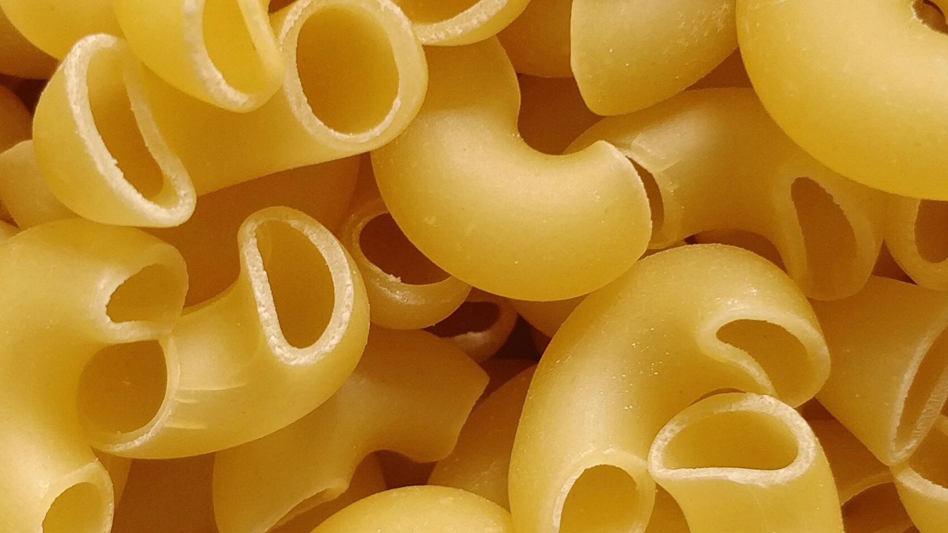 yellow rubber balloons in close up photography