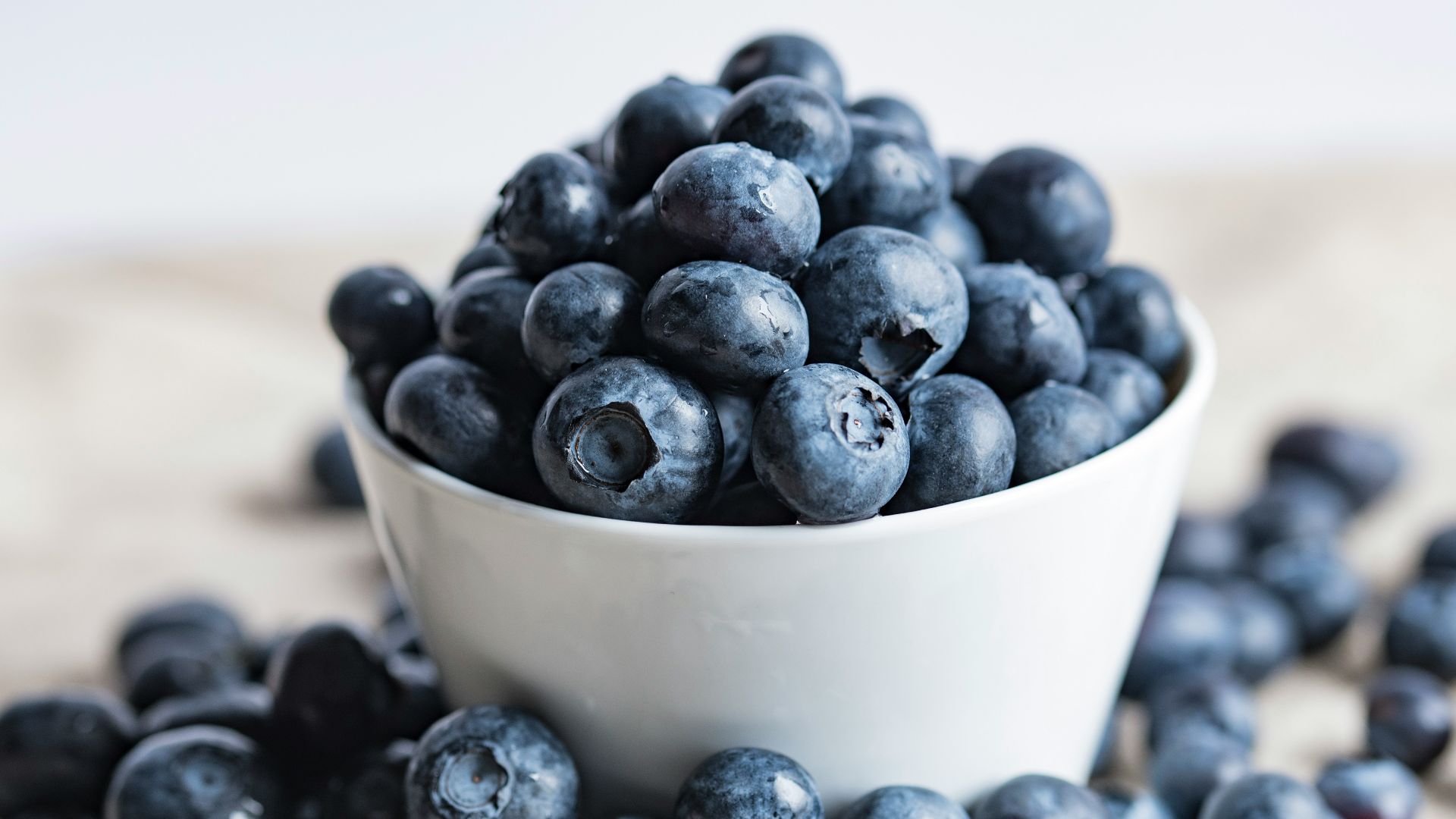 blueberries on white ceramic container