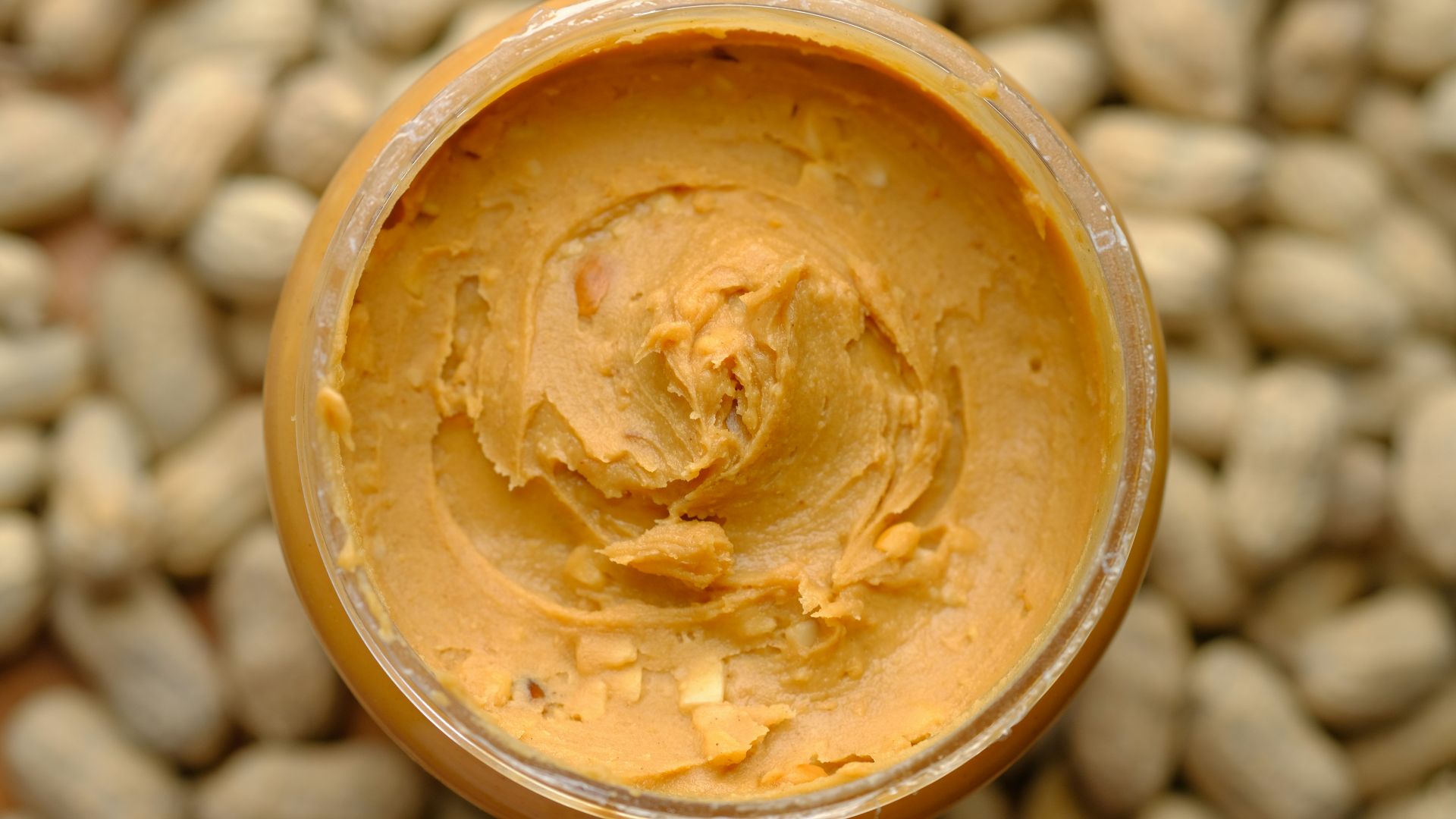 brown powder in brown round container