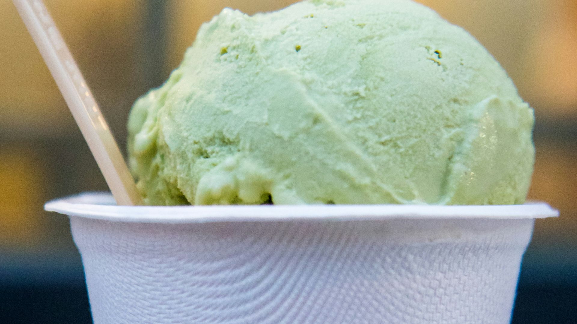 selective focus photo of cup of ice cream