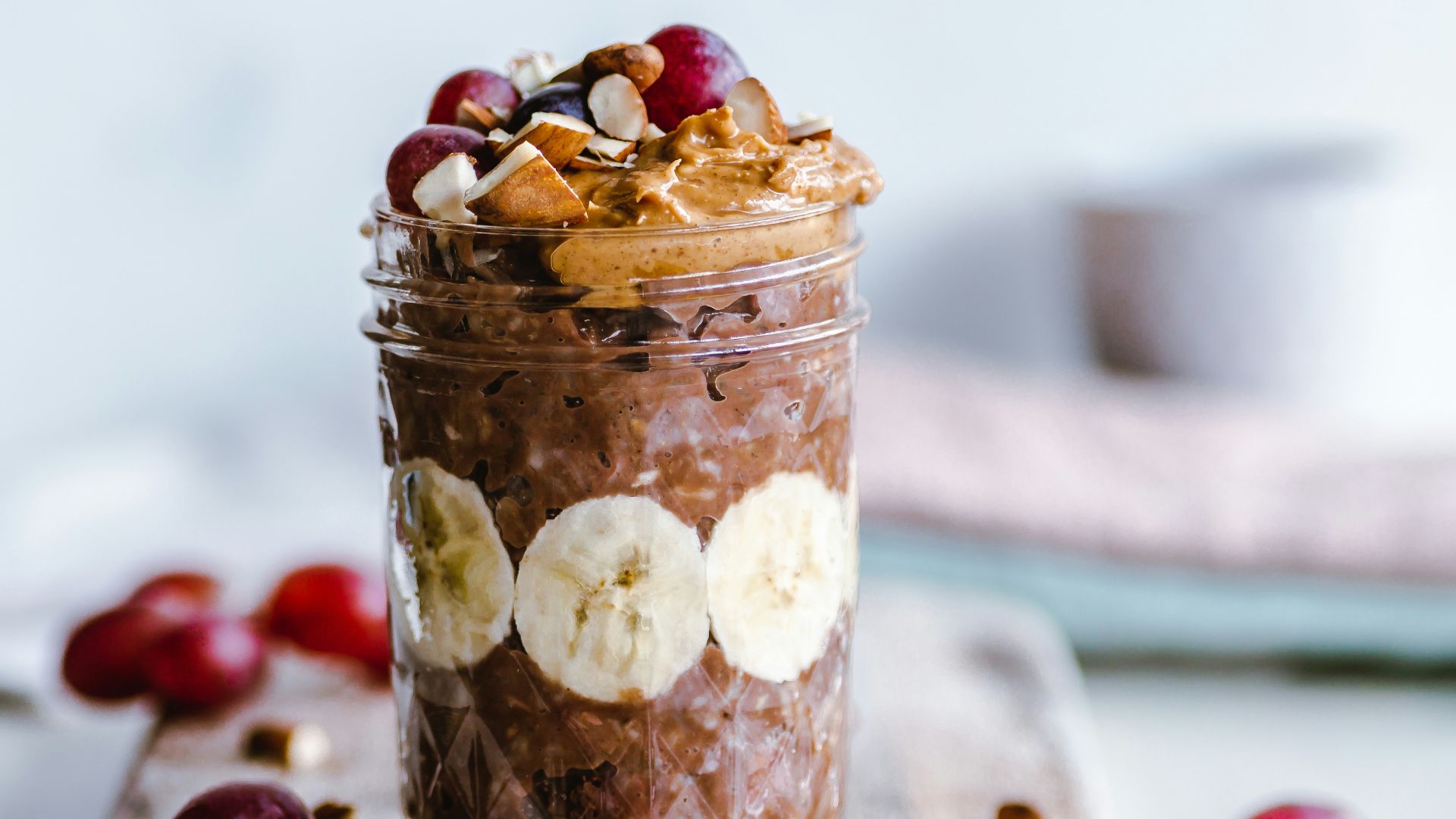 fruits and cream in clear glass cup
