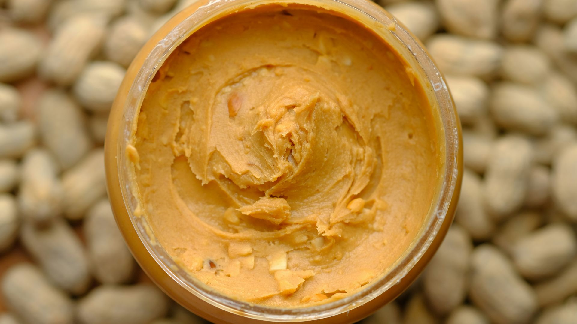 brown powder in brown round container