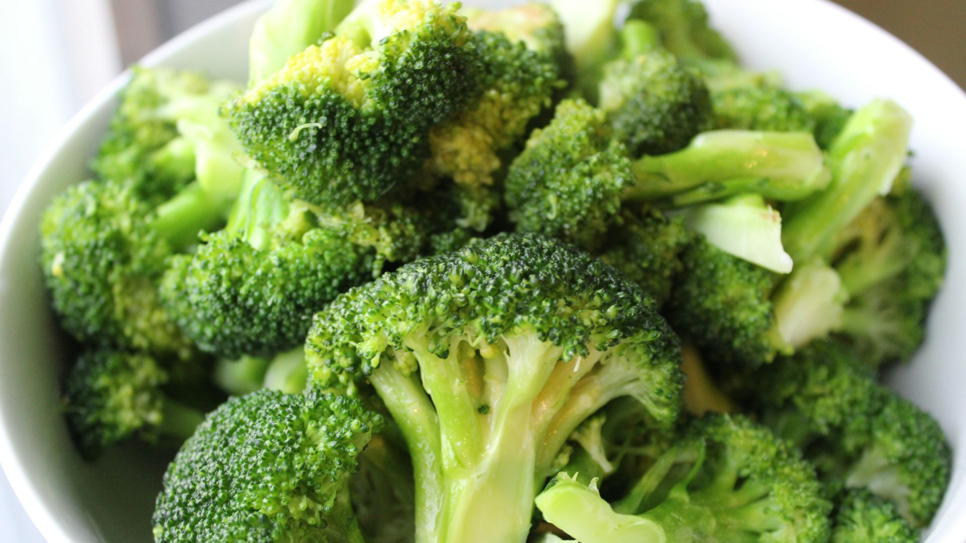 green broccoli on white ceramic plate