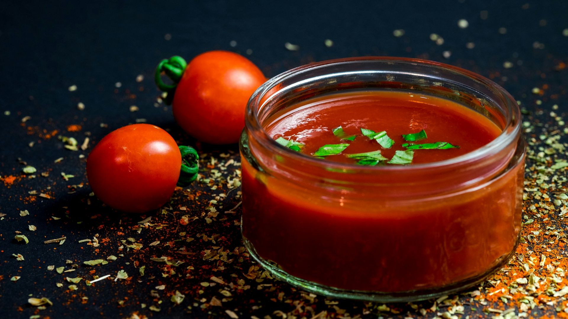 tomato and tomato puree with parsley in bowl