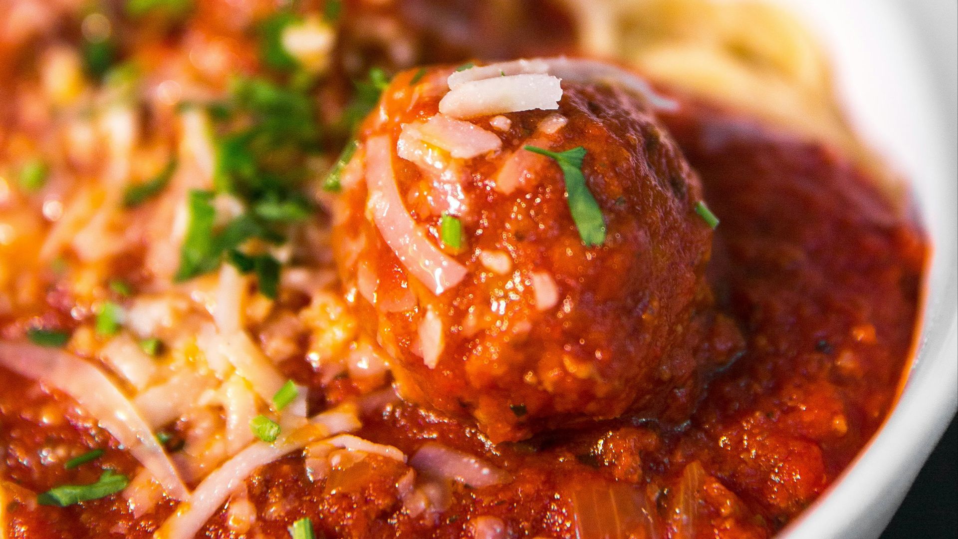 meta balls with noodles served on white ceramic bowl