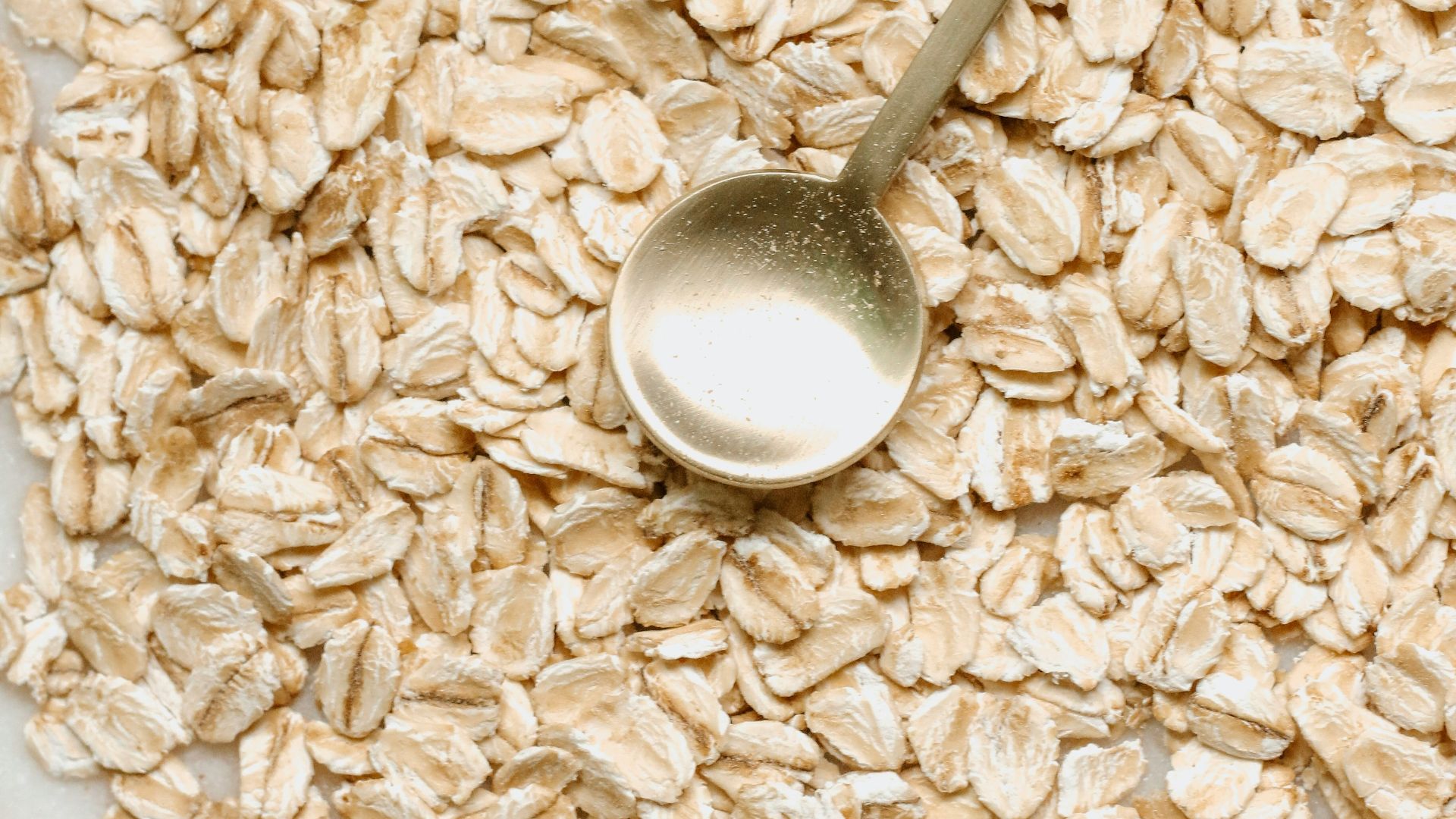 silver spoon on white rice