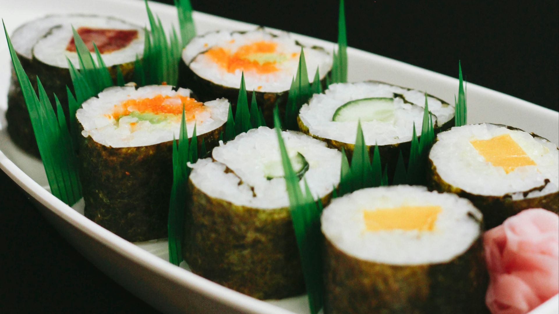 neatly presented sushi on plate