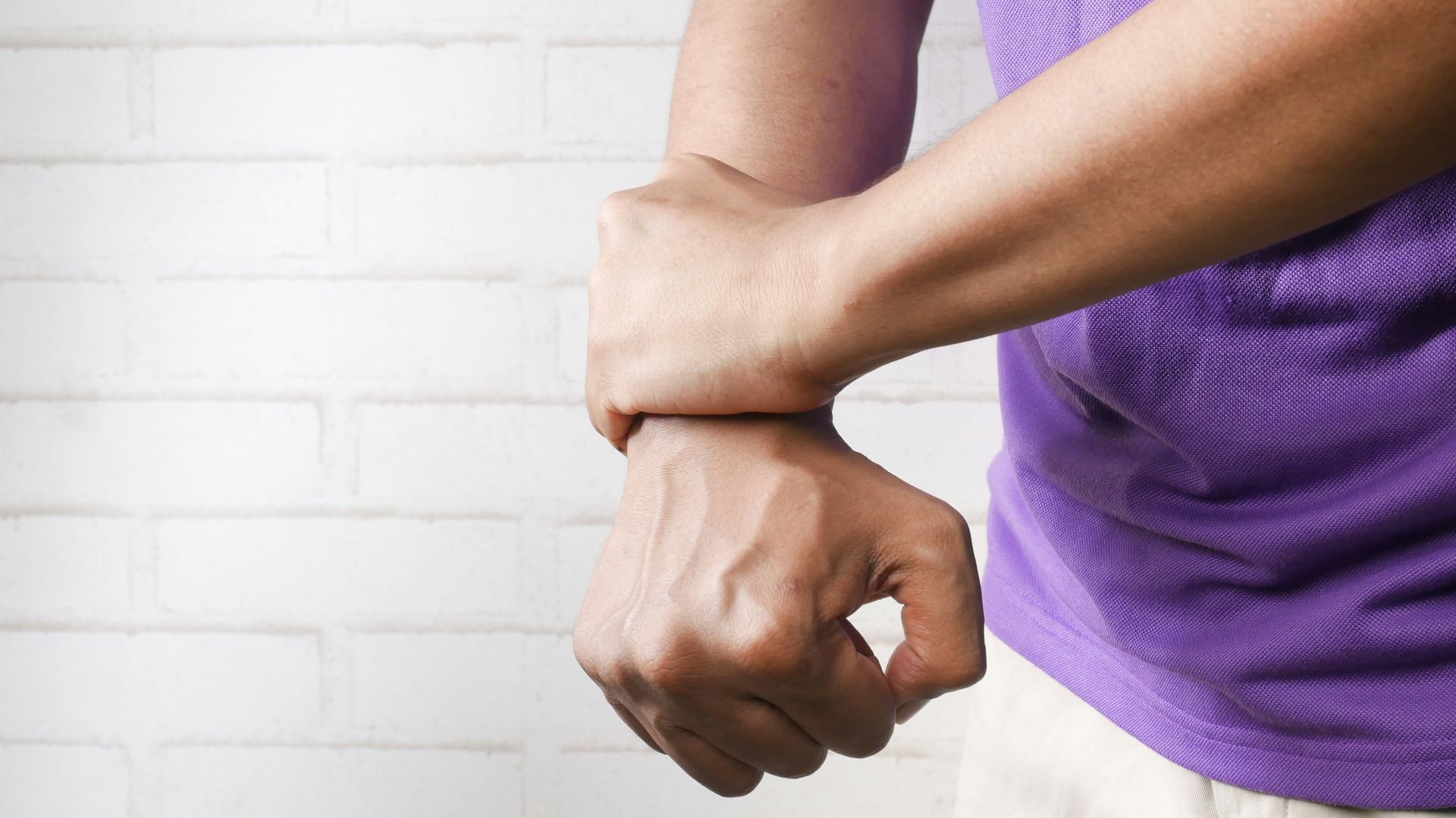 person holding hands of another person