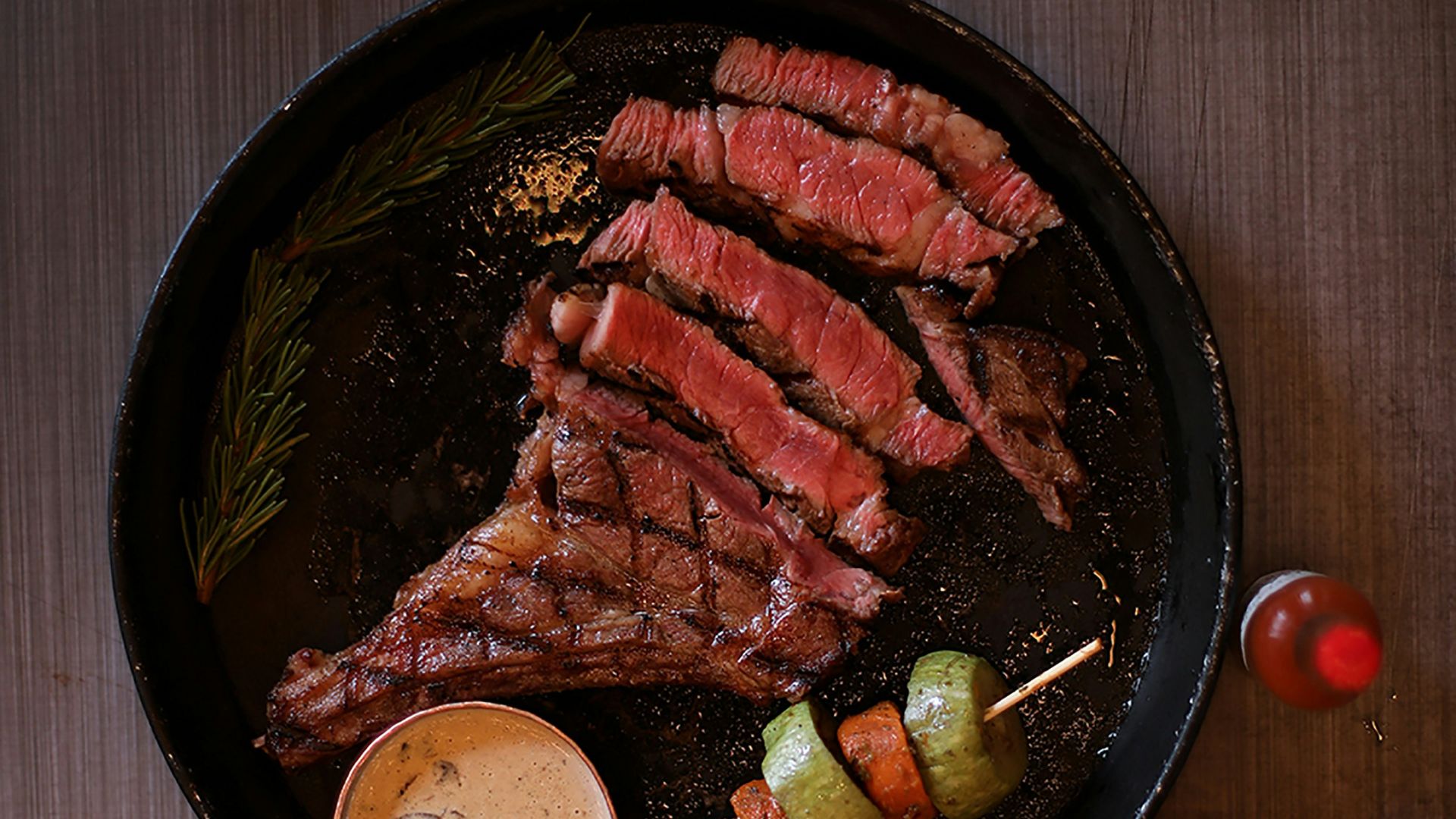 a plate of meat and vegetables on a table