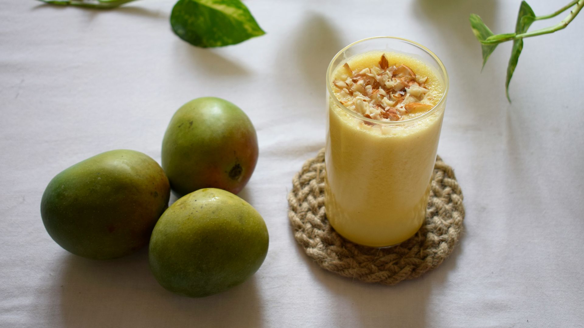 green apple beside clear drinking glass with milk