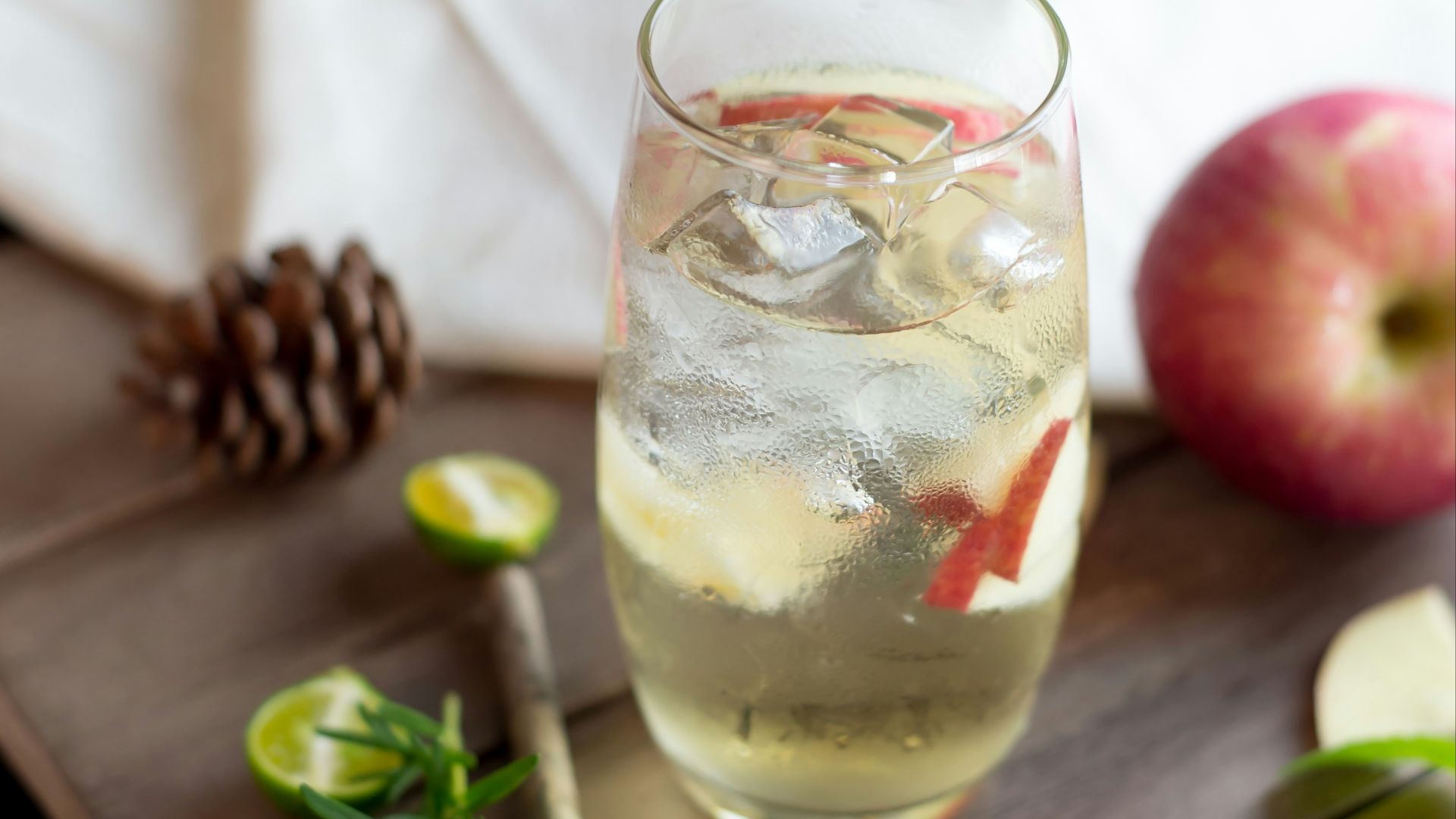 clear drinking glass with yellow liquid inside