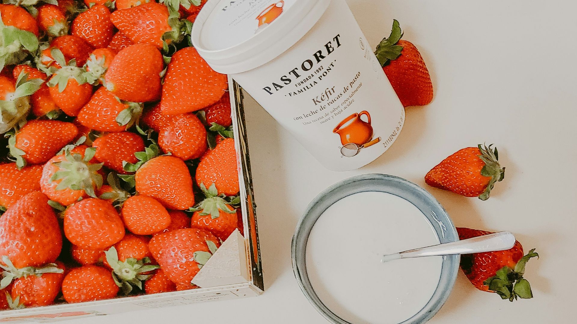 strawberries on white plastic cup