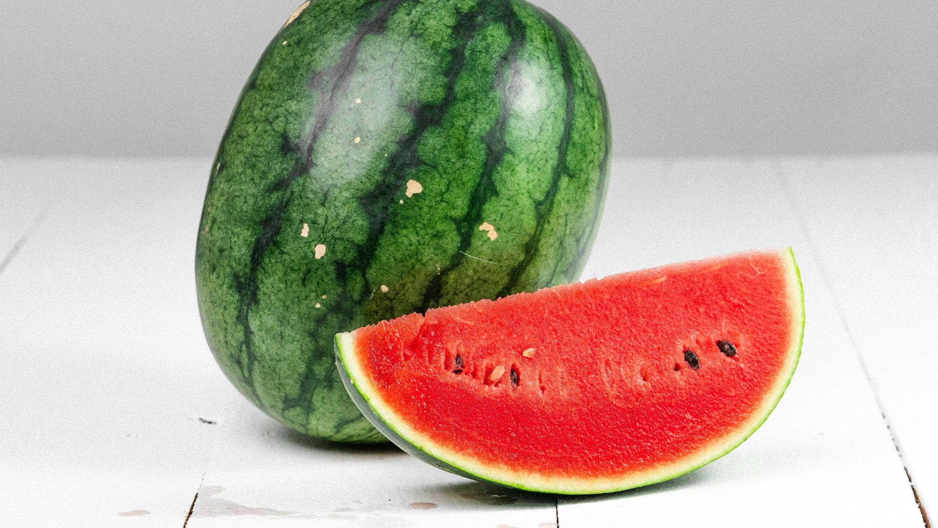 watermelon fruit on white table