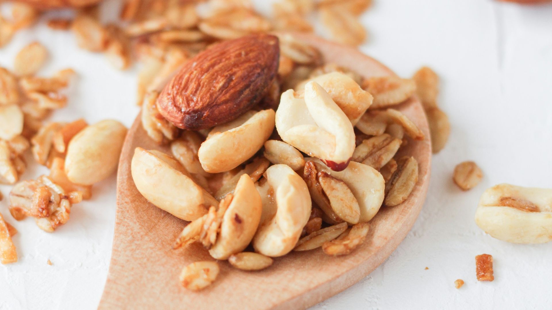 brown wooden spoon with brown and white food