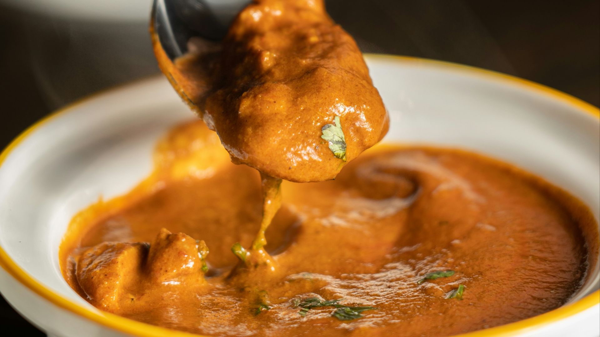 orange mushy dish in bow