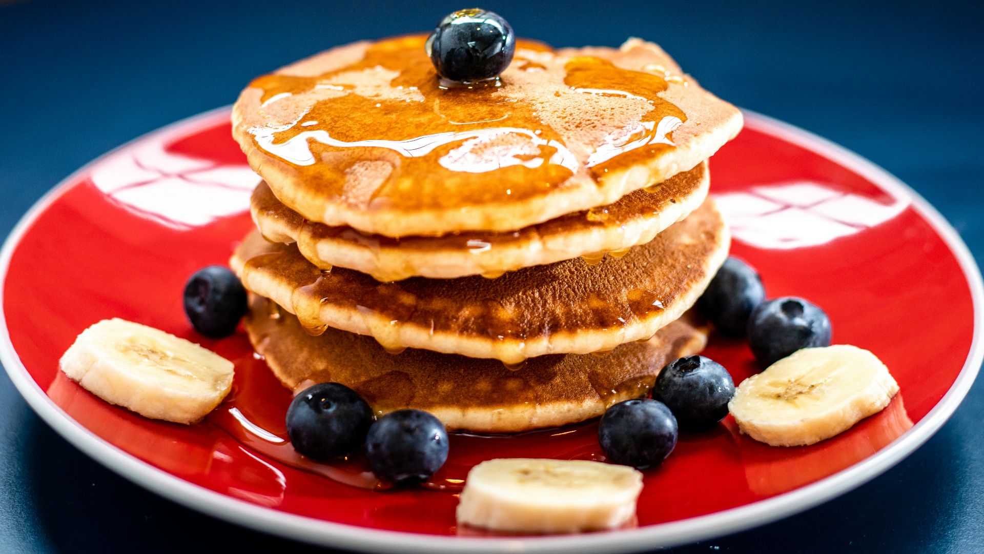 baked pancake with blueberry and slice of banan
