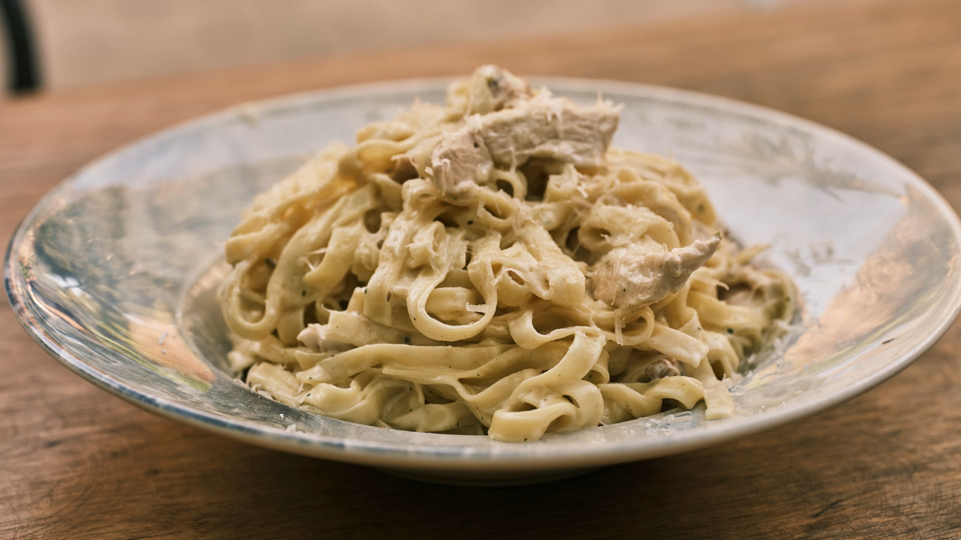 a plate of food on a wooden table