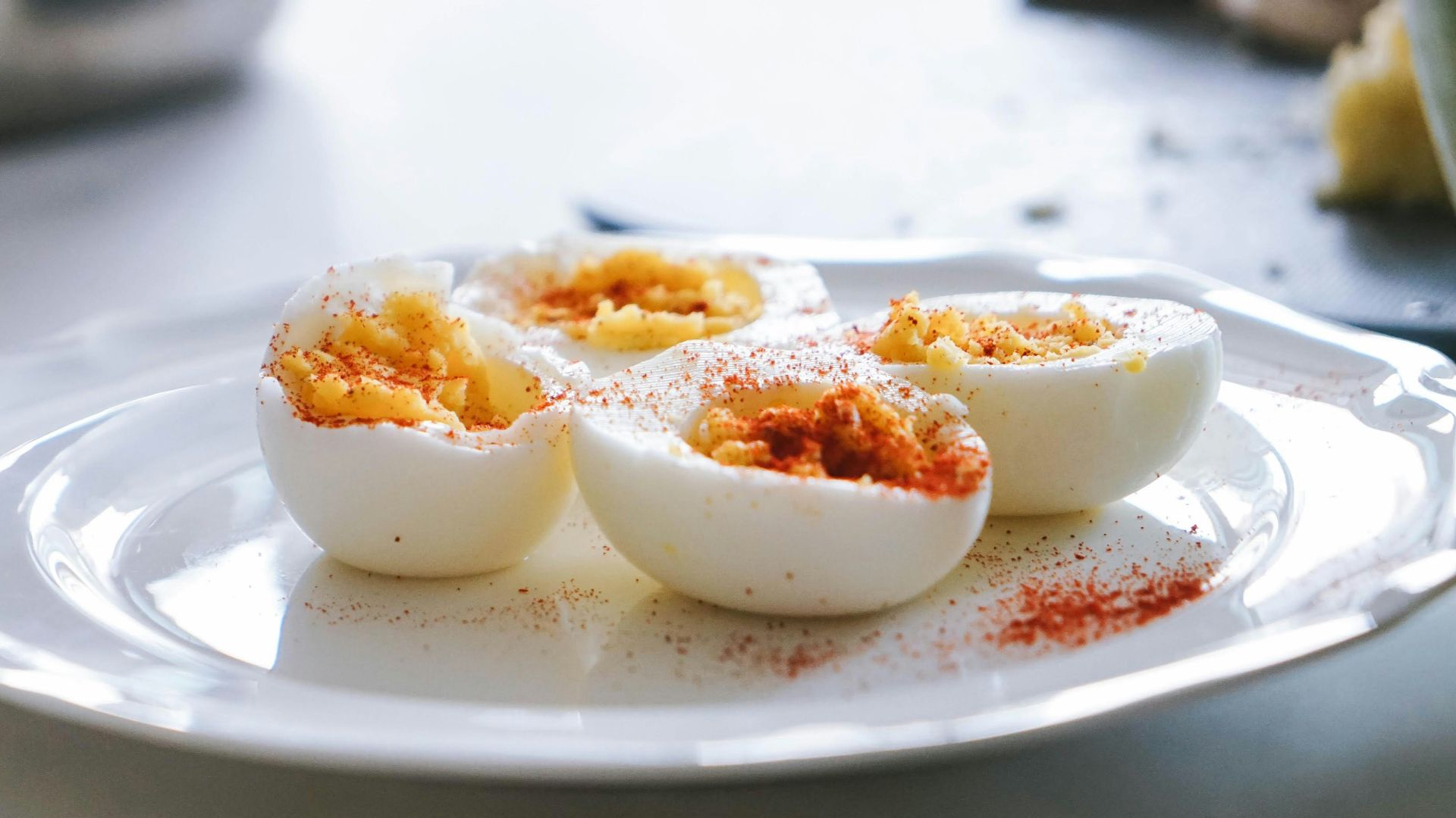 sliced hard boiled eggs on plate