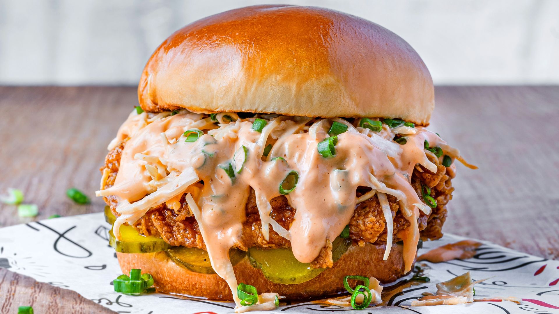 burger on white and red paper