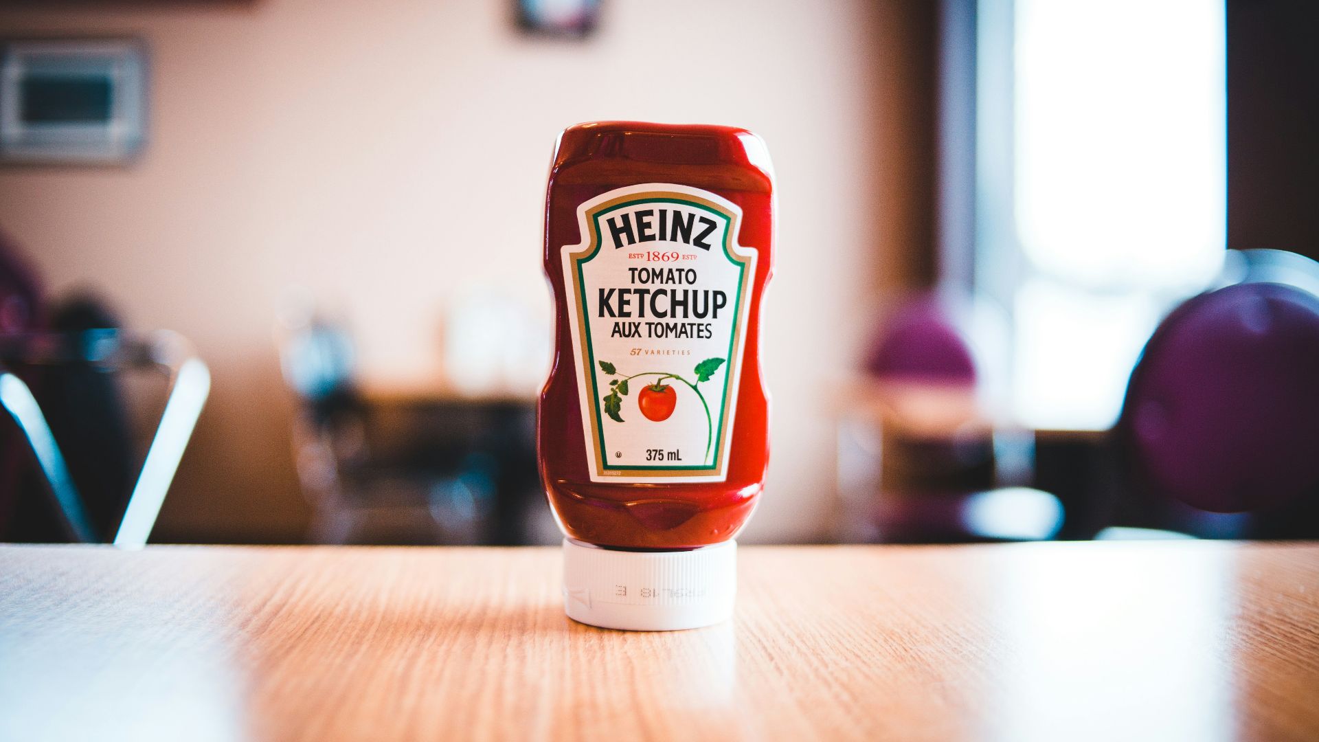 heinz tomato ketchup bottle on brown wooden table