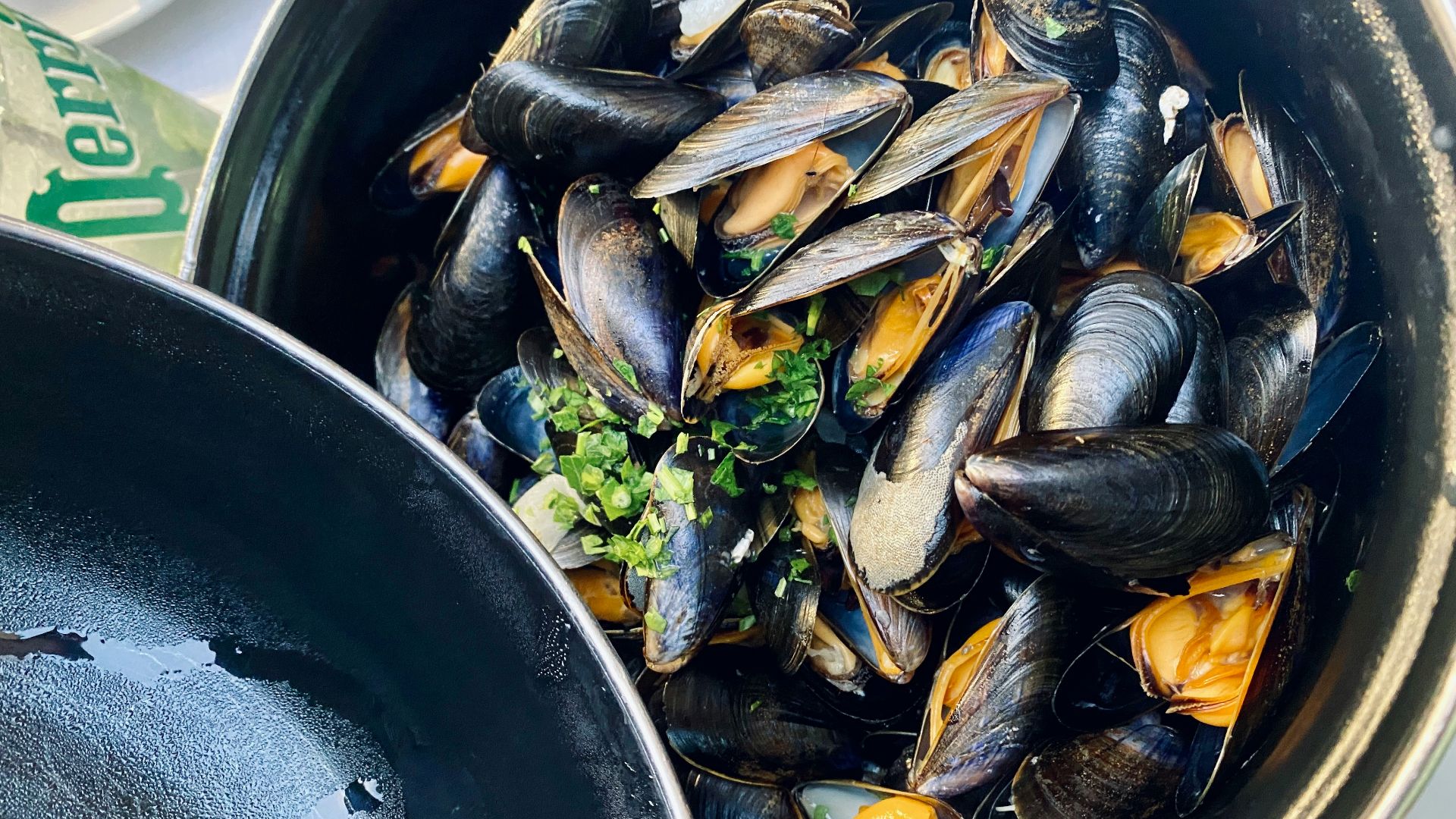 black fish on black round container