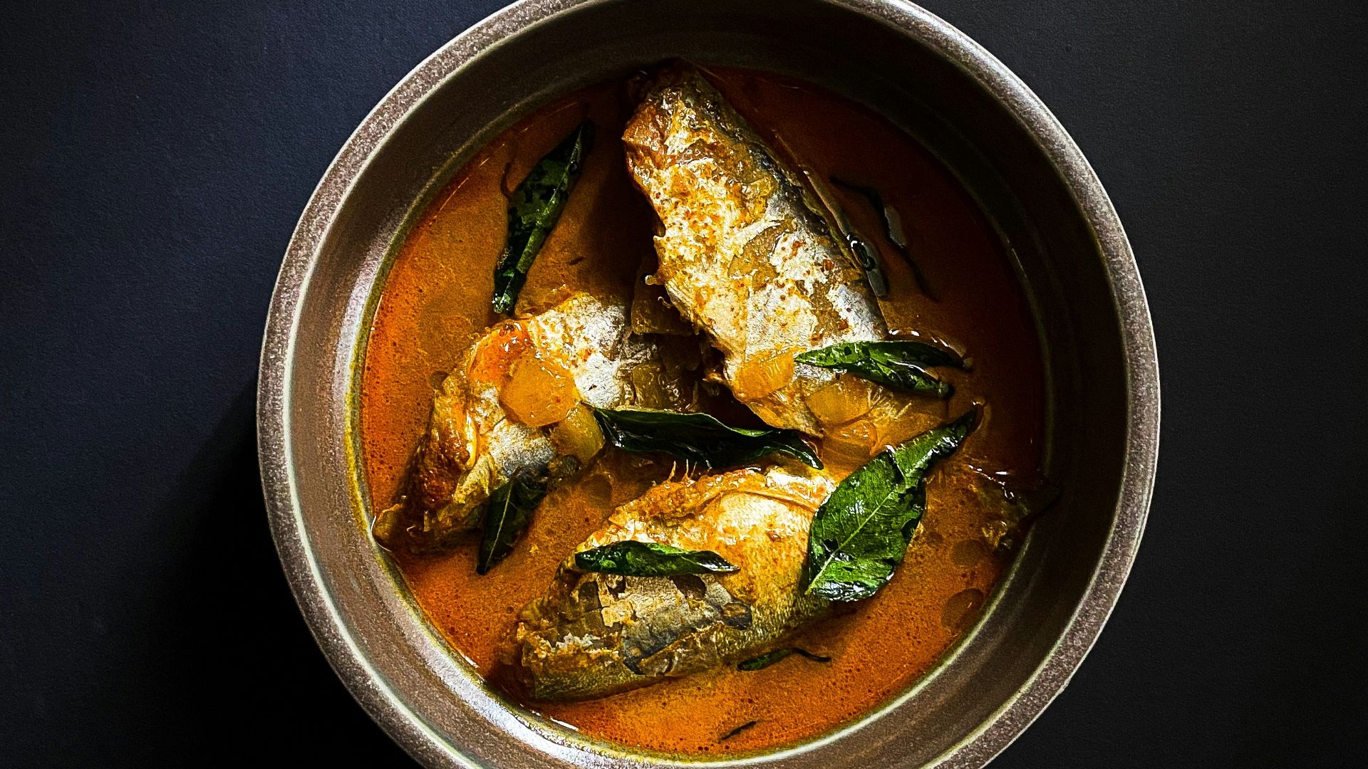 cooked food in round stainless steel bowl