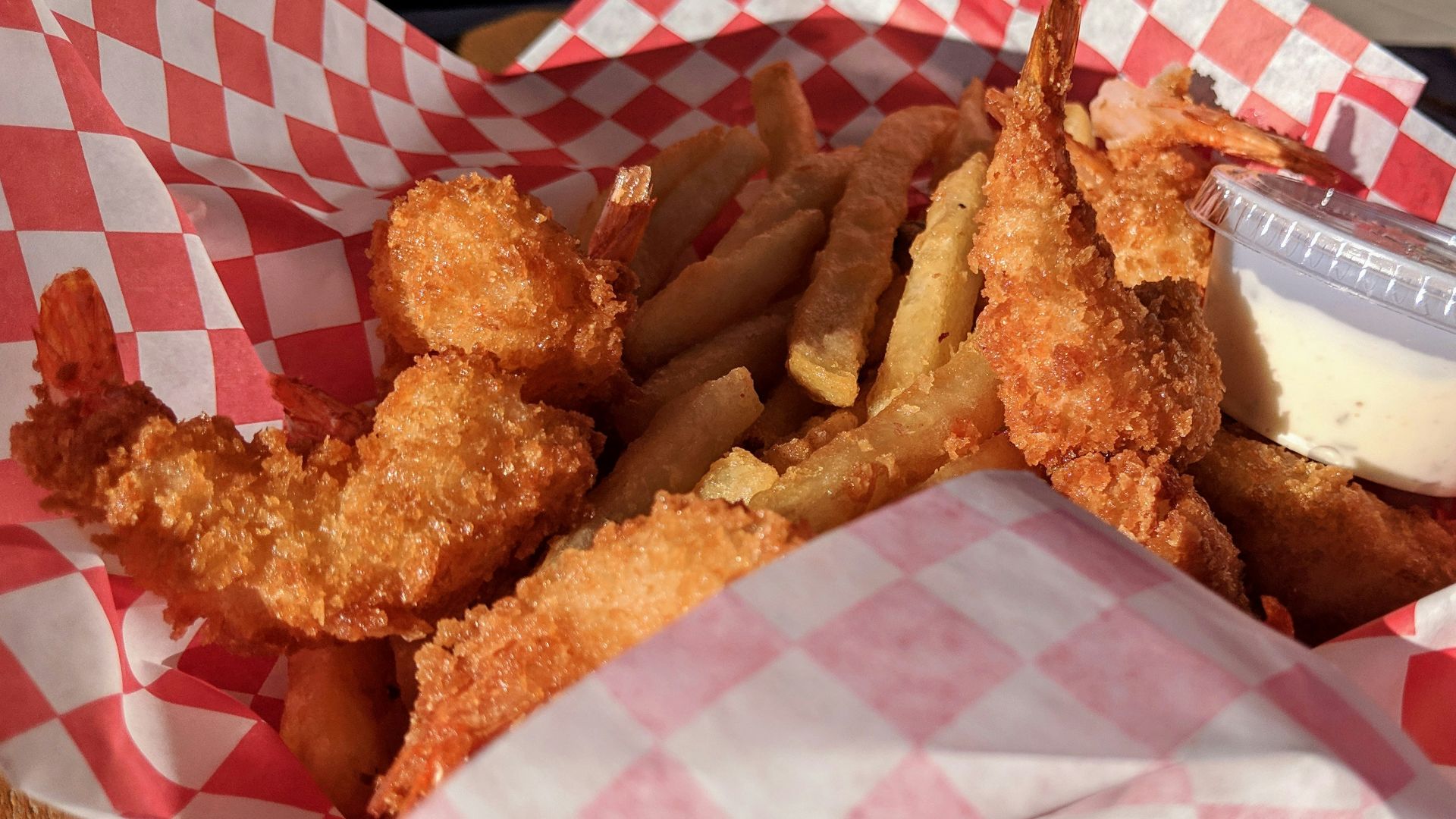 fried shrimp on white and red tray