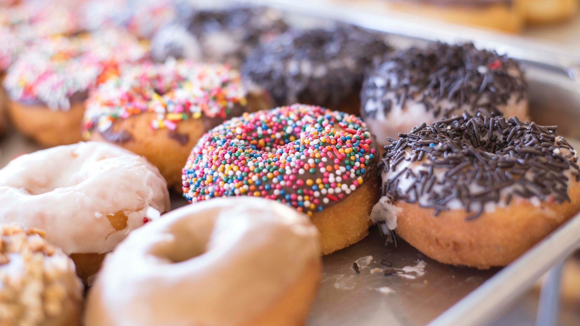 brown donuts on white tray