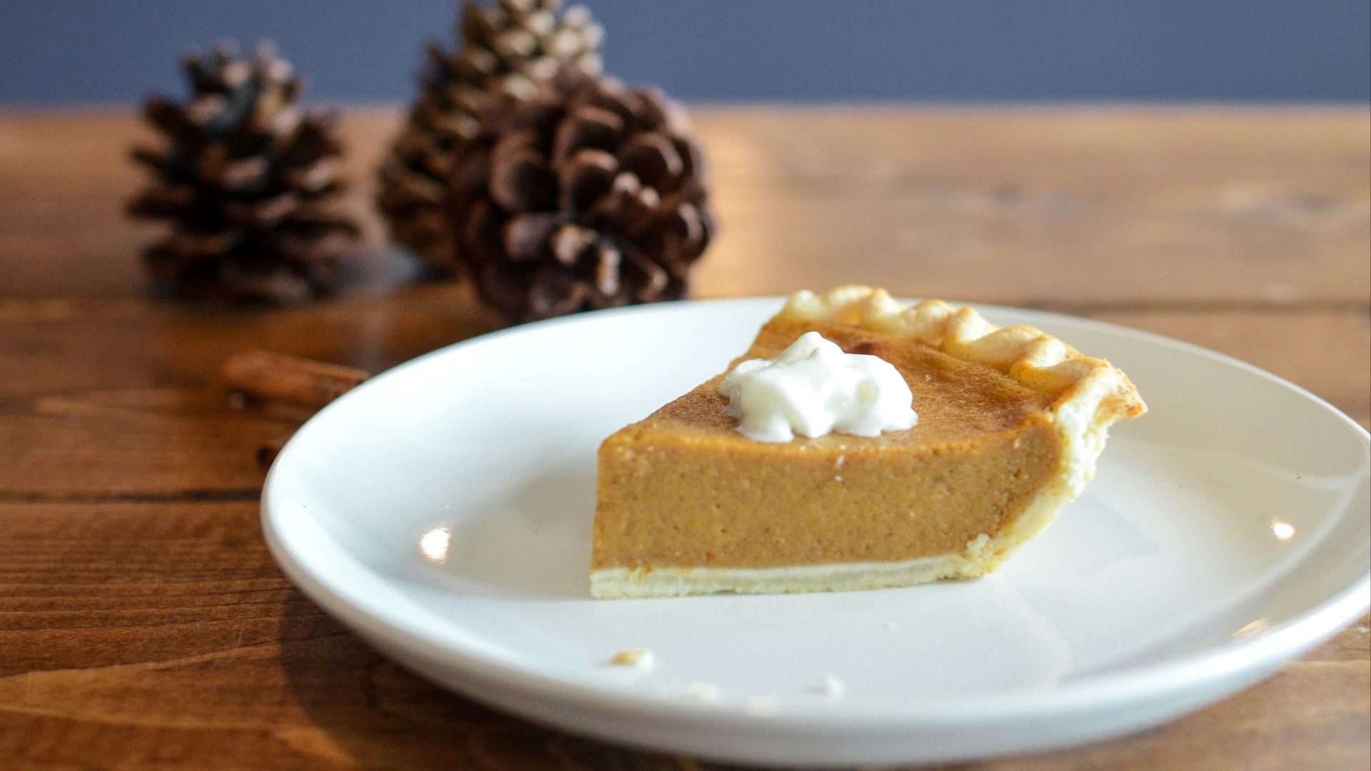 closeup photo of sliced pie on white ceramic saucer