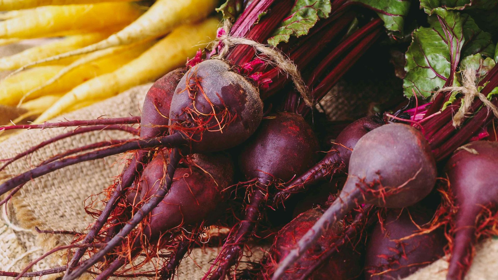 a table topped with lots of different types of vegetables