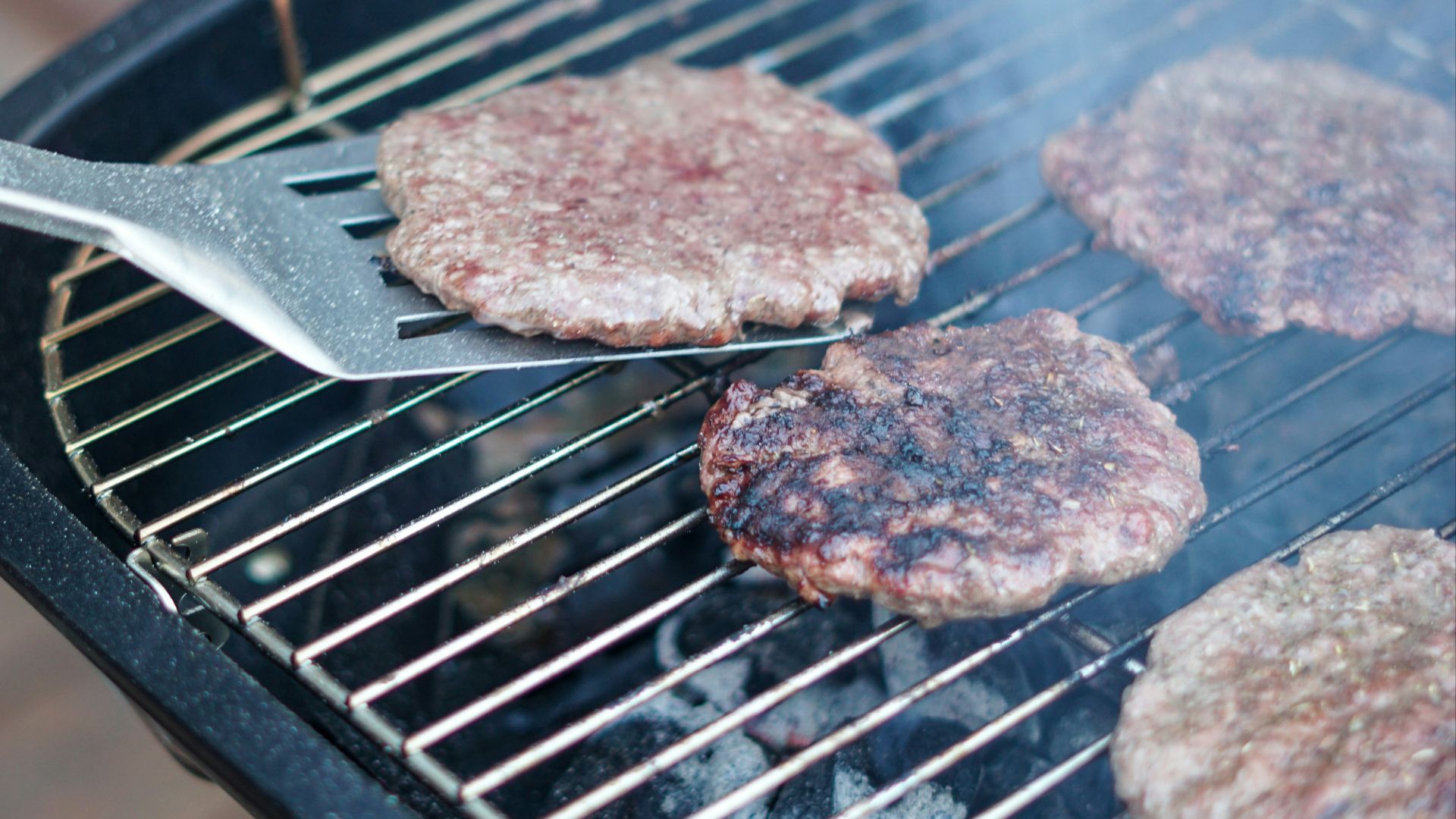 brown meat on black grill