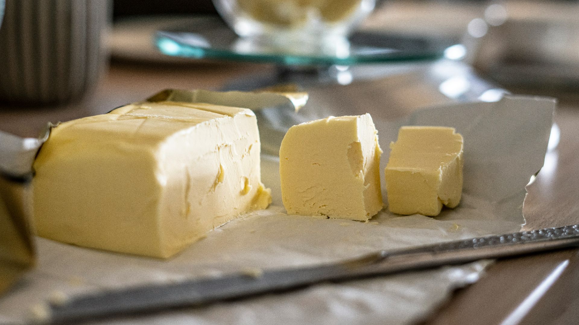 sliced cheese on clear glass plate