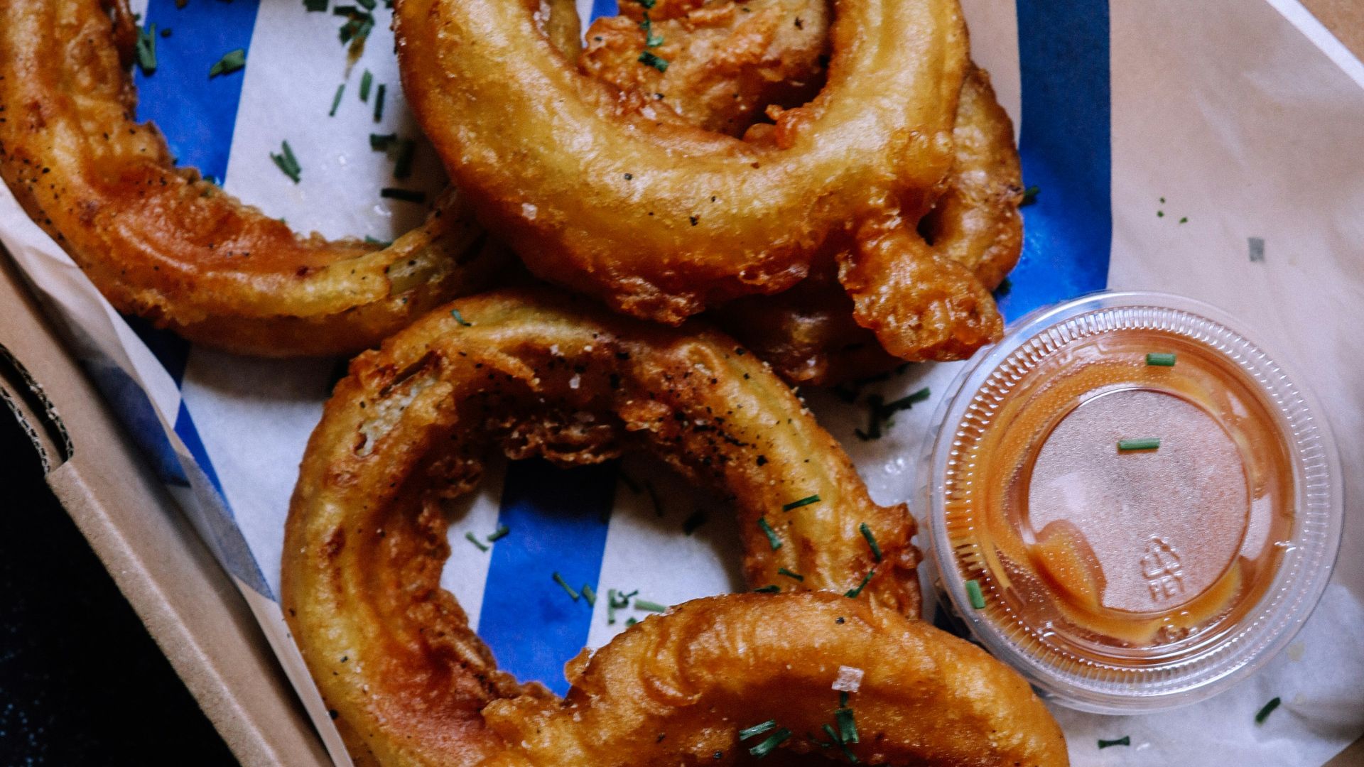 onion rings on white paper