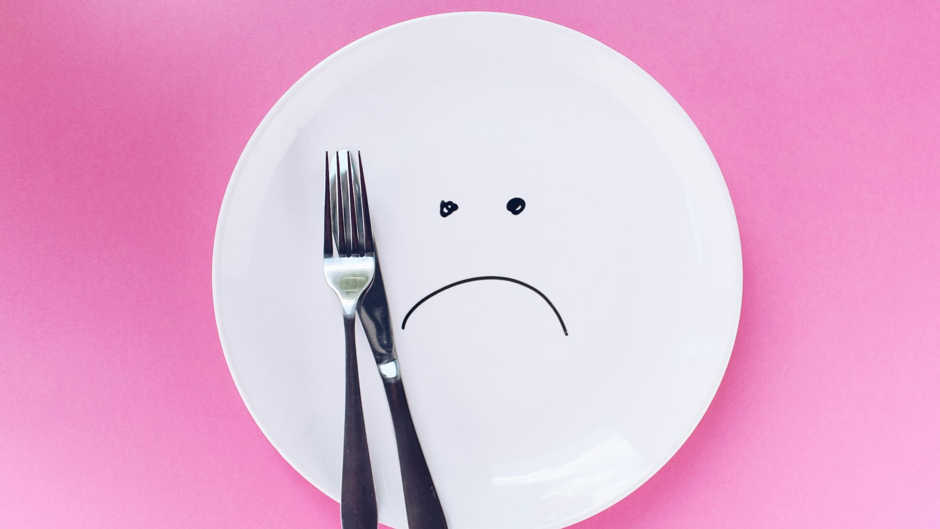silver fork and knife on plate