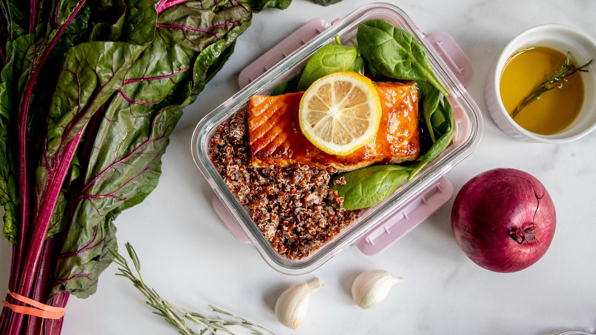 sliced orange fruit on white ceramic plate