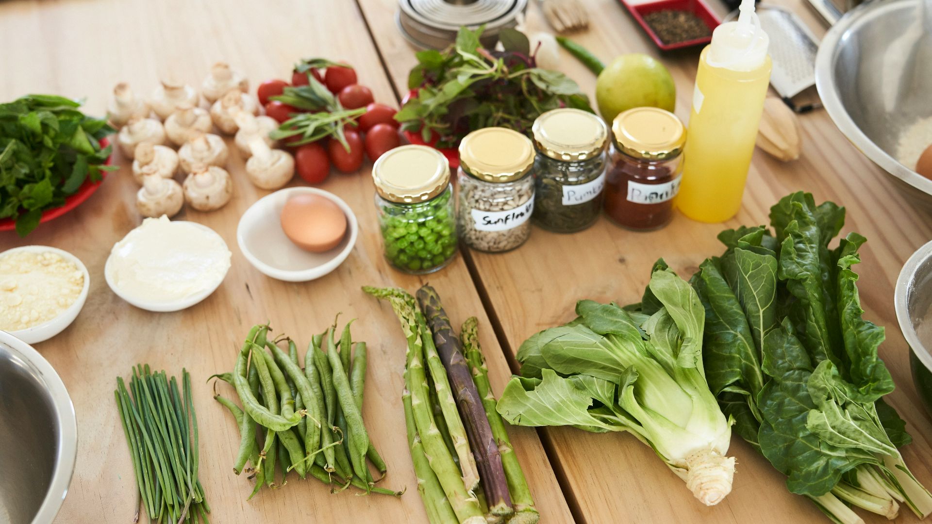 green vegetable on brown wooden table