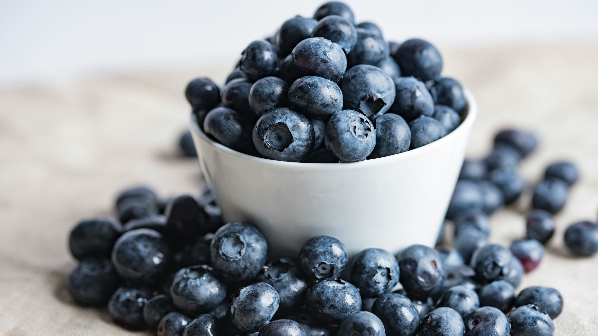 blueberries on white ceramic container