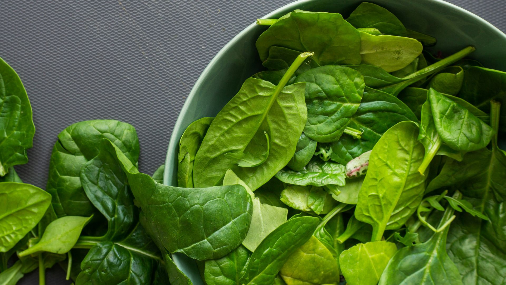 green leaves on white ceramic bowl