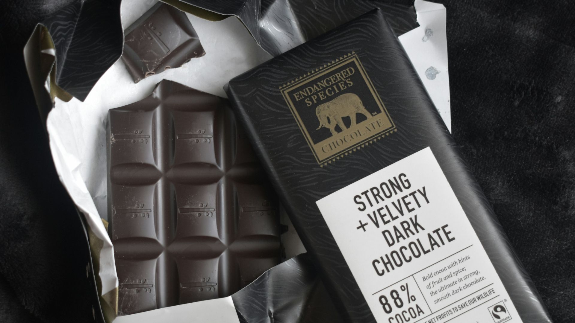 white and brown labeled chocolate bar