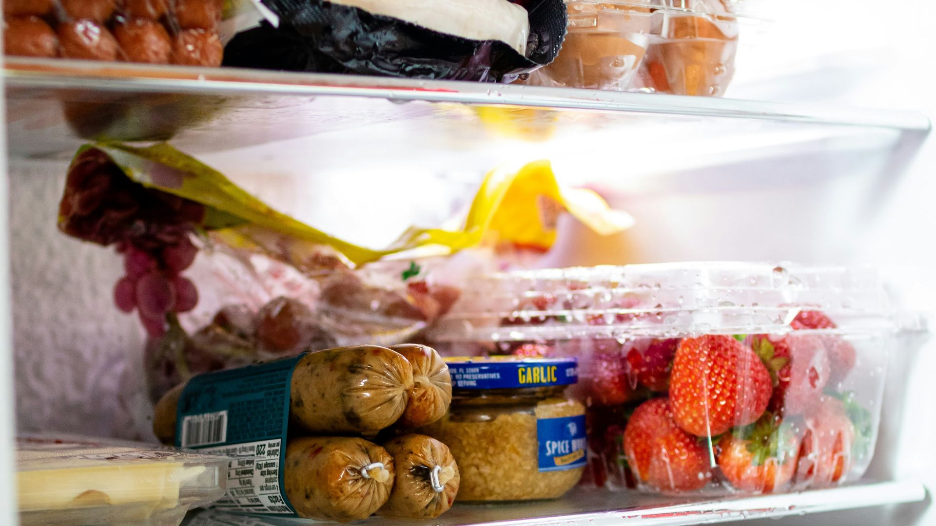 a refrigerator filled with lots of food and drinks