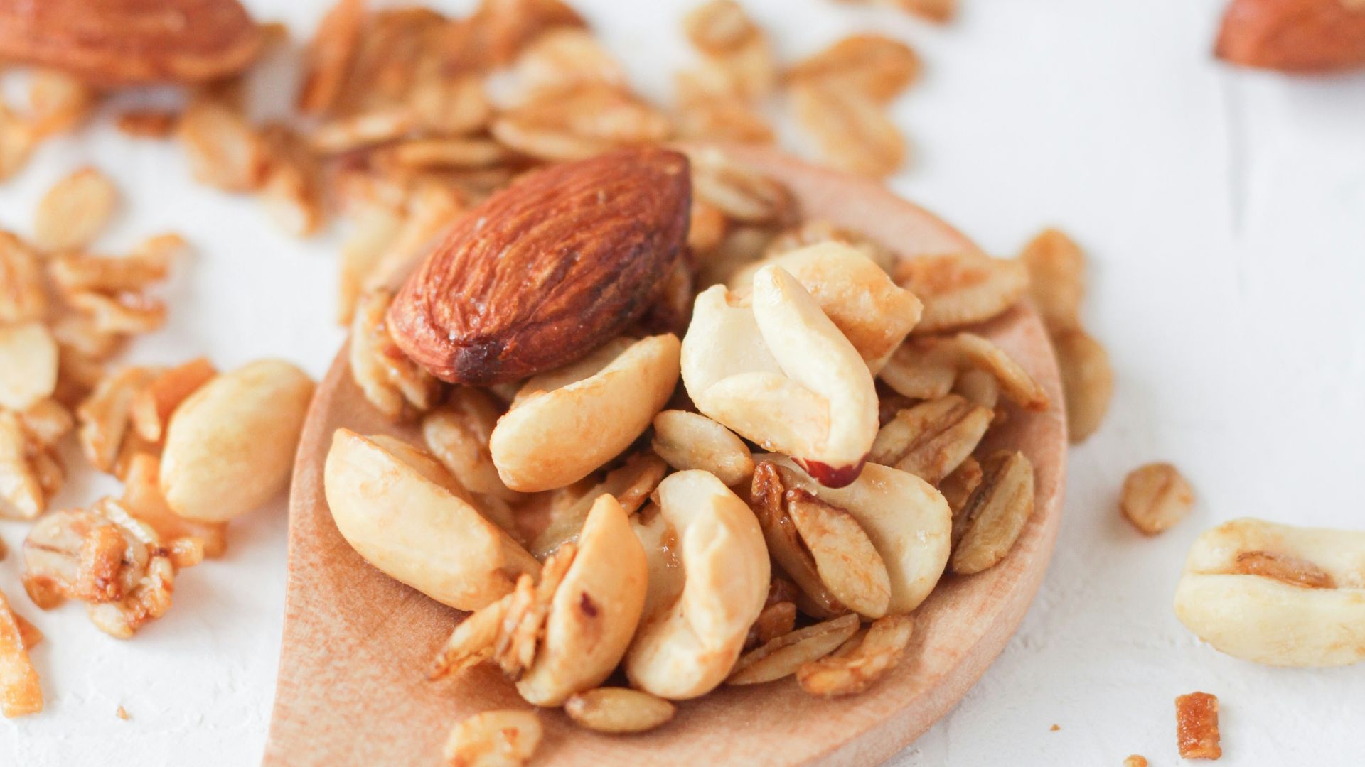 brown wooden spoon with brown and white food