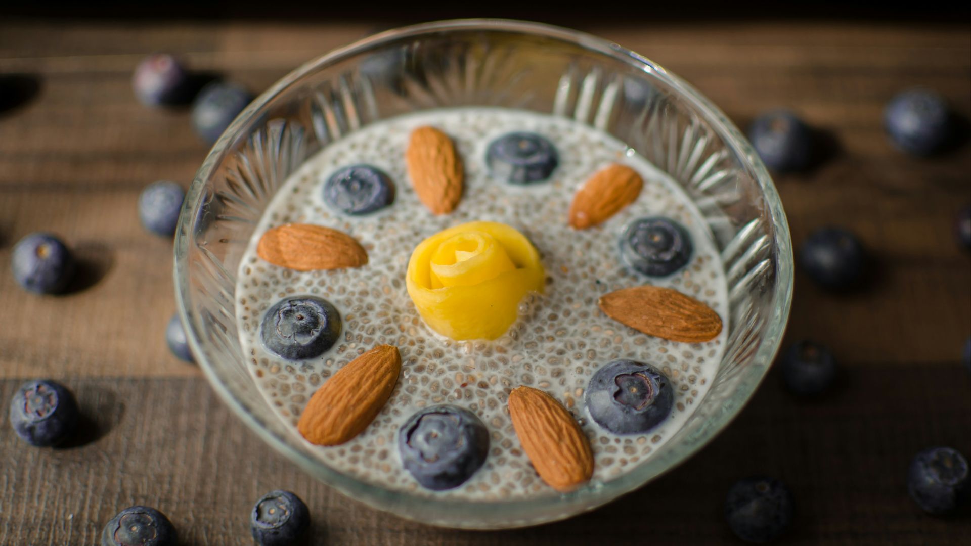 yellow and white round cake on silver round plate