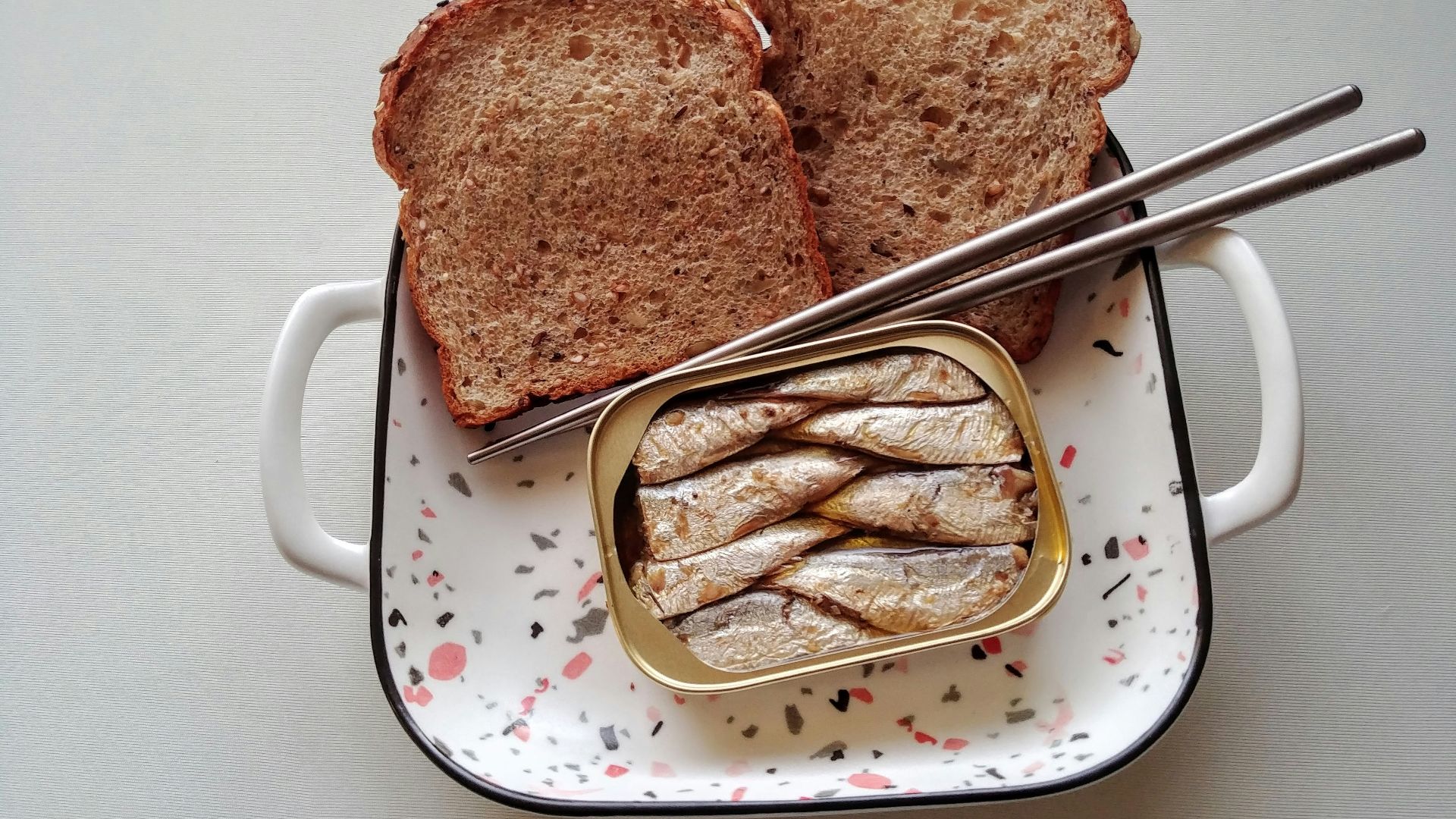 toasted bread on white and red polka dot plate