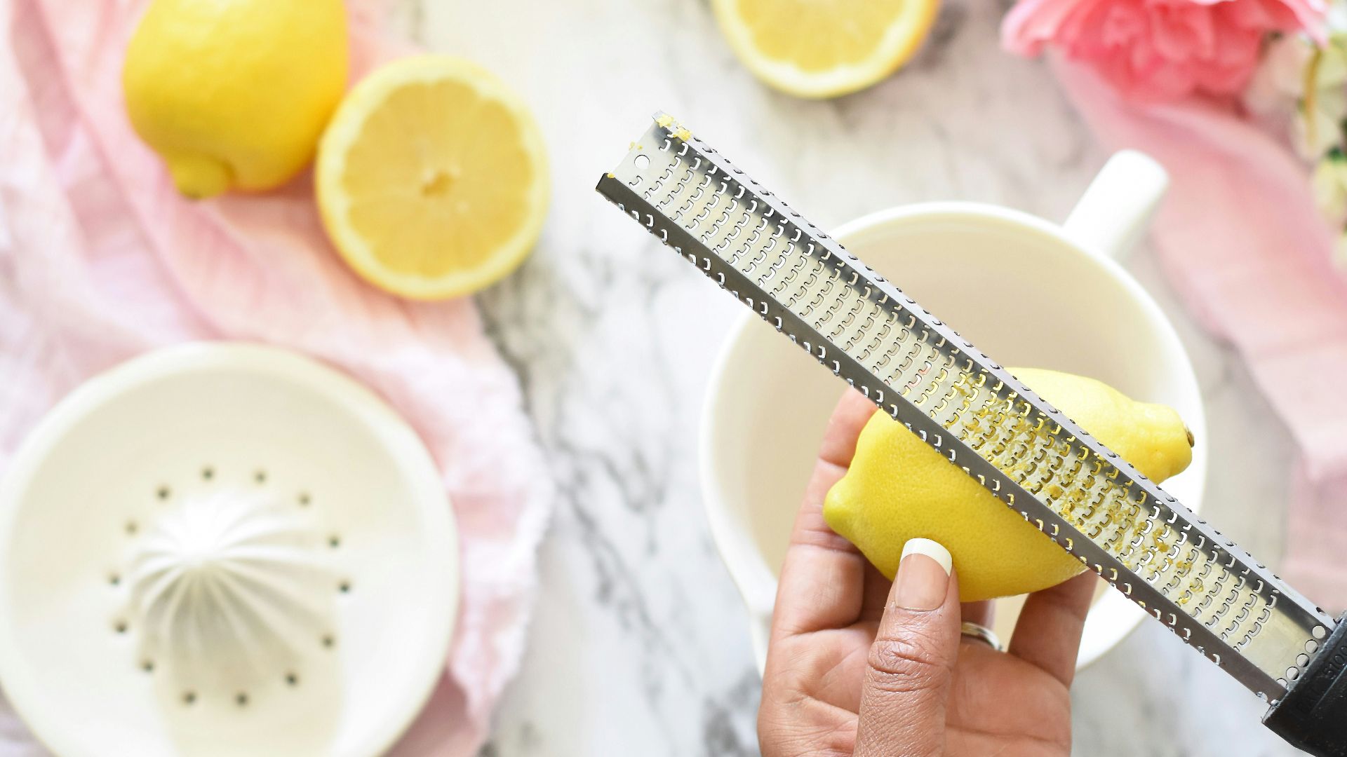 person slicing lemon