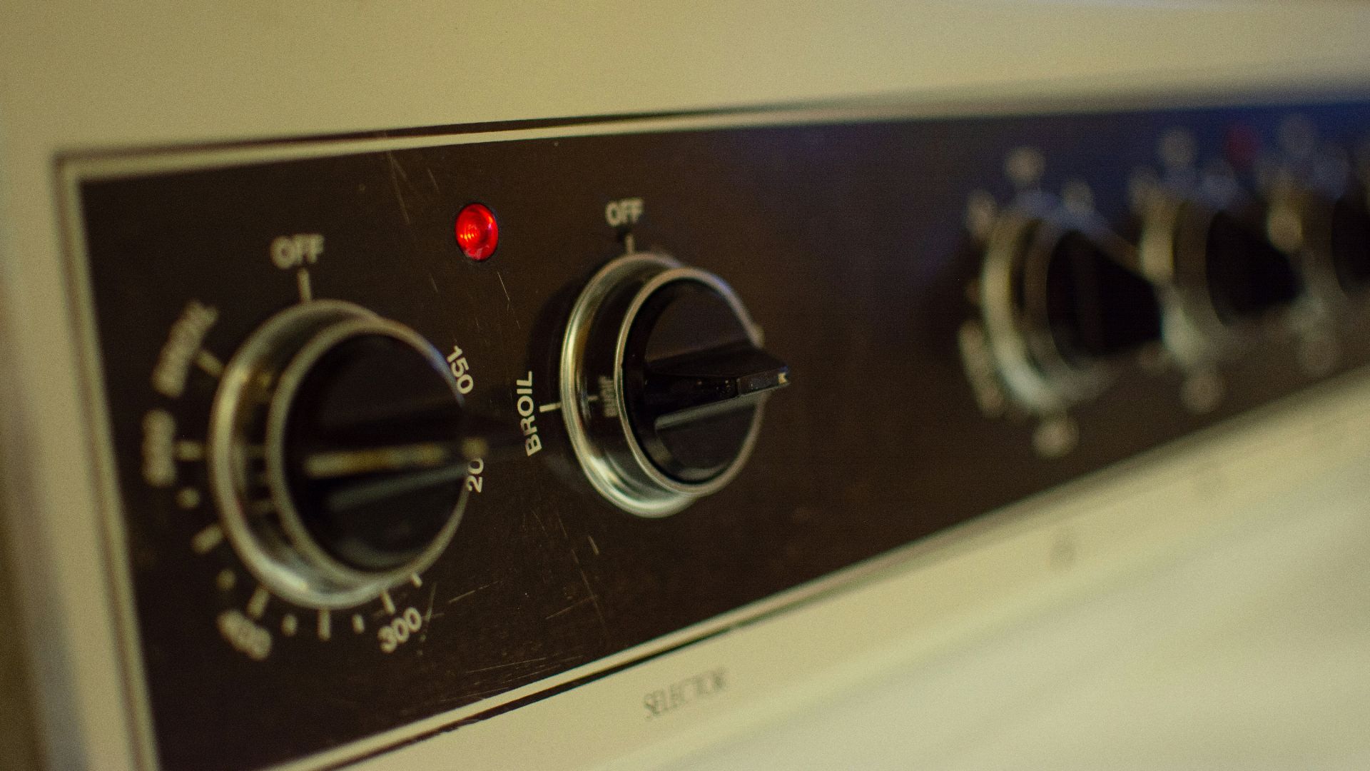 a close up view of the knobs on a stove